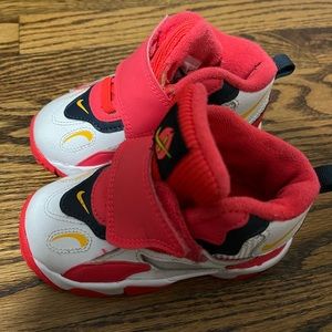 Coral and white Nikes